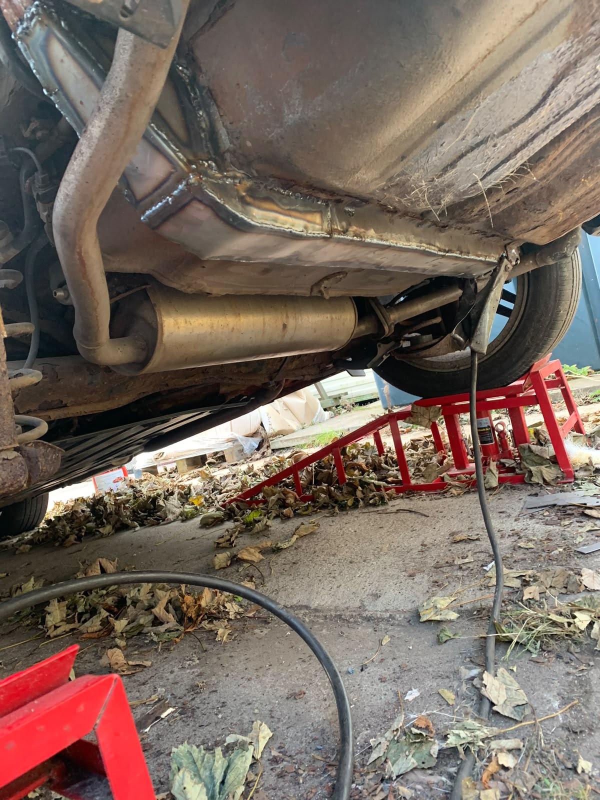 Fabricated underbody rust repair welded into place